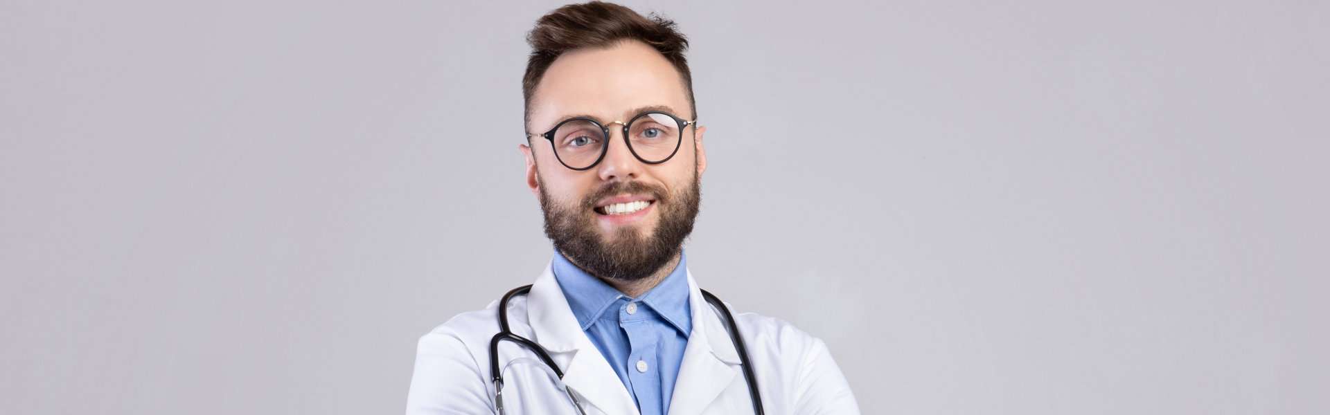 Male doctor smiling